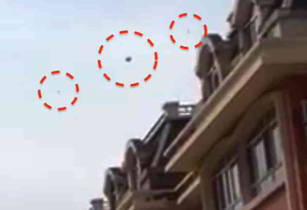 拍到3个神秘UFO飞越中国办公楼上空！